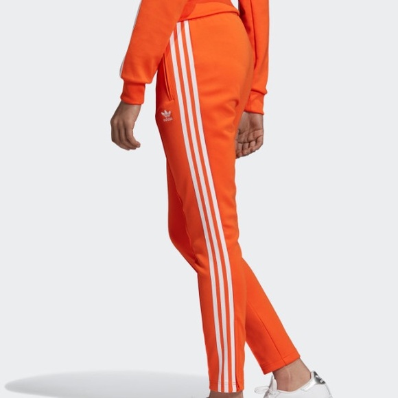 adidas sst orange track pants